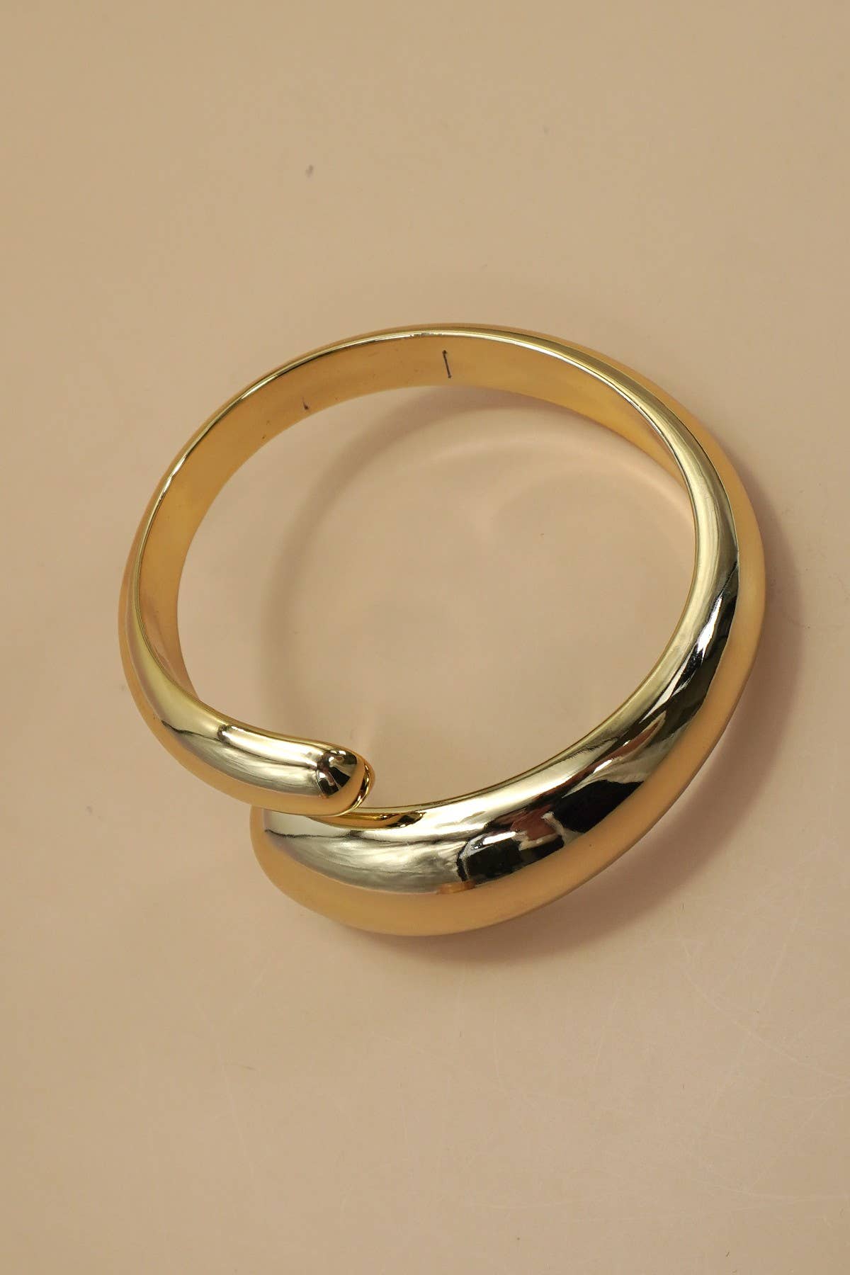 Teardrop-Shaped Gold Bangle Bracelet