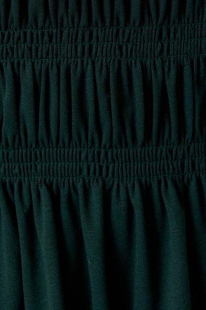 Smocked Long Sleeve Peplum Top